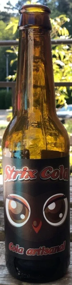 Strix cola
