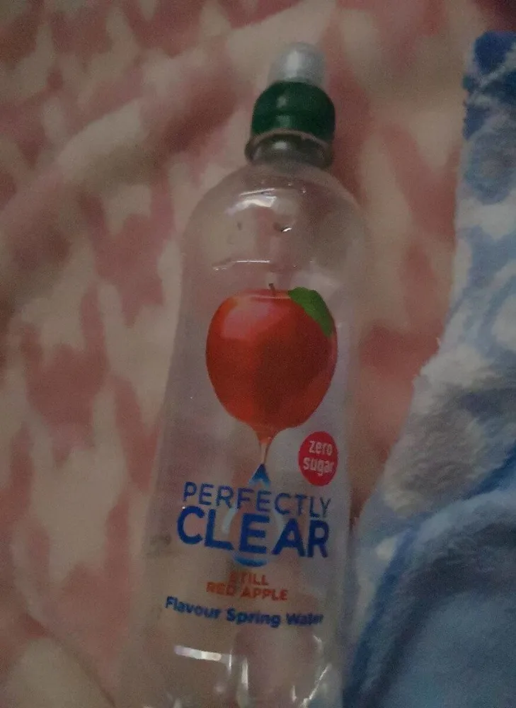 Perfectly clear still red apple