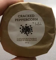 Cracked pepercorn cultured nut product