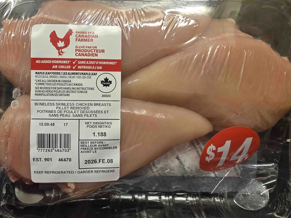 Boneless skinless chicken breasts fillet removed