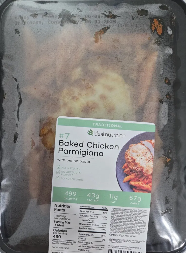 Signature Chicken Parmigiana with Penne Marinara Pasta