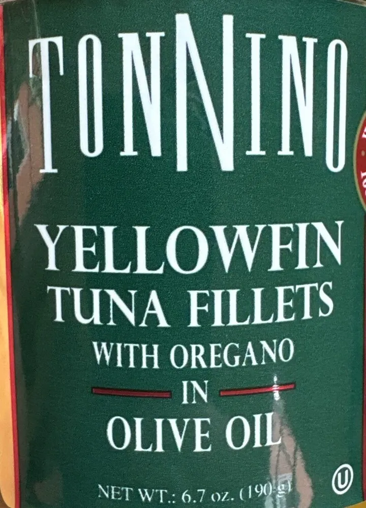 Tuna fillets with oregano in olive oil