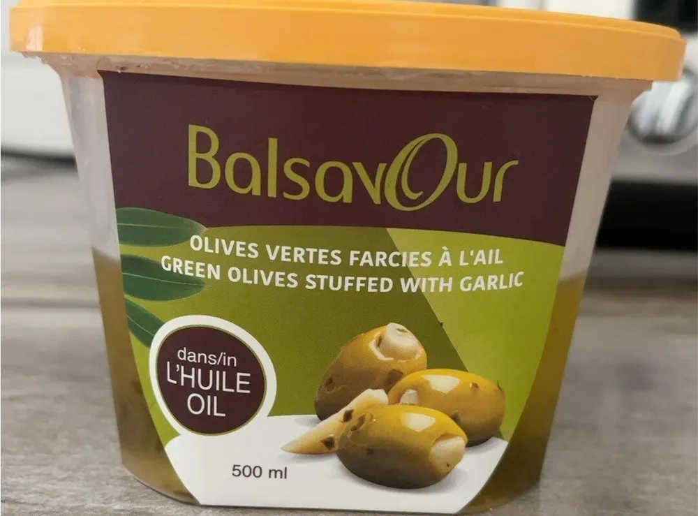 Green olives stuffed with garlic in oil