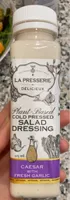 Plant based cold pressed salad dressinv ceasar with fresh garlic