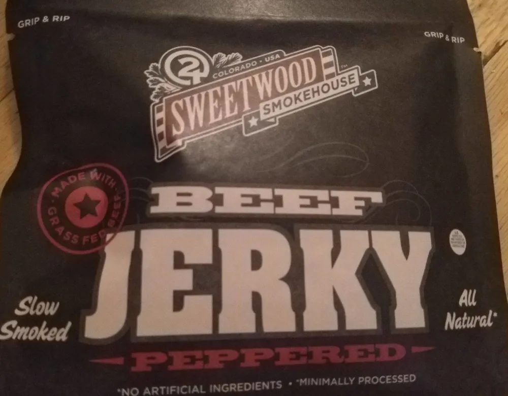 Peppered slow smoked beef jerky, beef