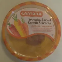 Sriracha Carrot Hummus made with White Beans and topped with Sunflower Seeds and Apricots