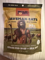 Caveman eats air-dried beef slices