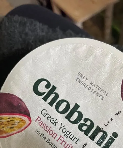 Low-fat greek yogurt with passion fruit on the bottom, passion fruit
