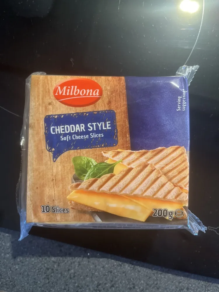 Cheddar style soft cheese slices