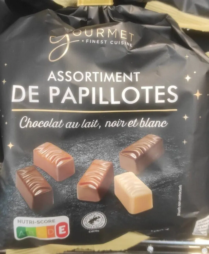 Assortiment de papillotes chocolat au lait, noir et blanc