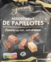 Assortiment de papillotes chocolat au lait, noir et blanc