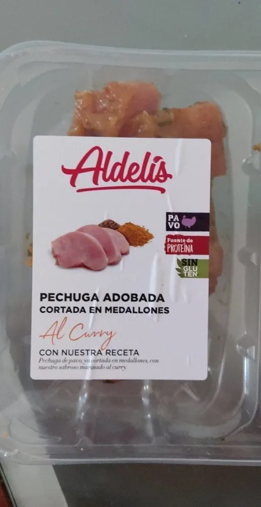 Pechuga adobada cortada en medallones