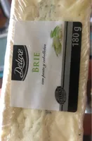 Queso brie con pesto y cebolletas