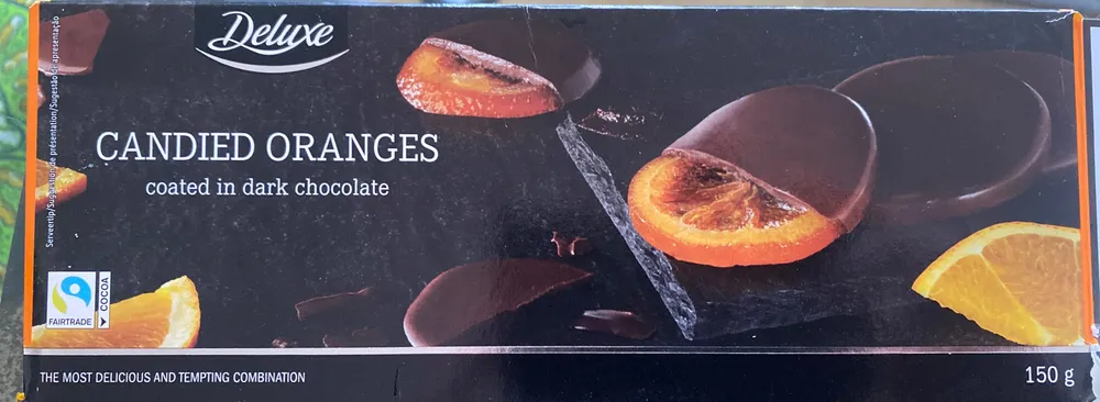 Naranjas confitadas bañadas en chocolate negro