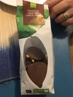 Chocolate disk with nuts and faisins