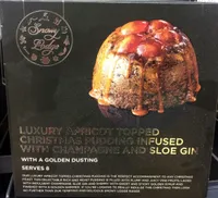 Luxury appricot topped Christmas pudding infused with Champagne and Sloe Gin