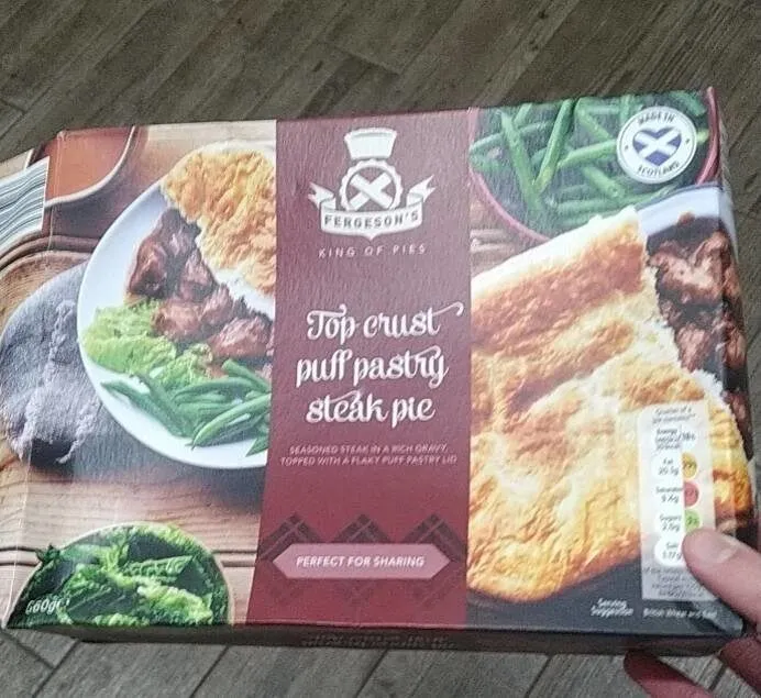 Top crust puff pasty steak pie