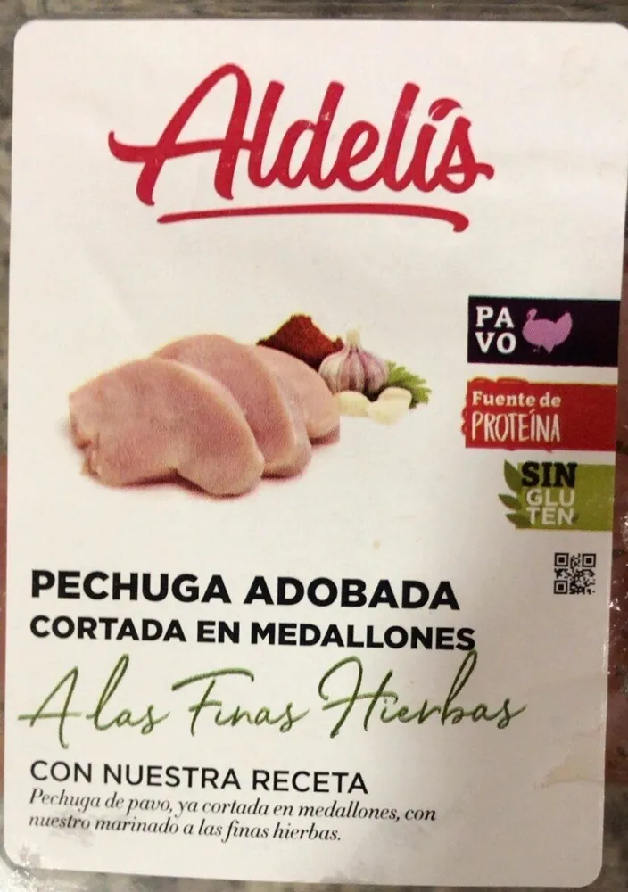 Pechuga adobada cortada en medallones a las finas hierbas