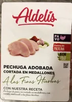 Pechuga adobada cortada en medallones a las finas hierbas