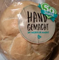 Semmel mit faschiertem Laibchen, Salat und Mayonnaise