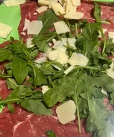 Carpaccio rucola e grana