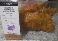 Medallones de pechuga de pavo marinados al curry