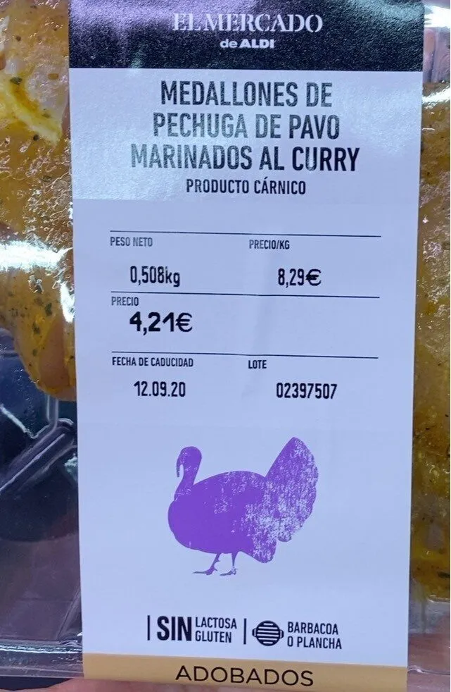 Medallones de pechuga de pavo marinados  curry