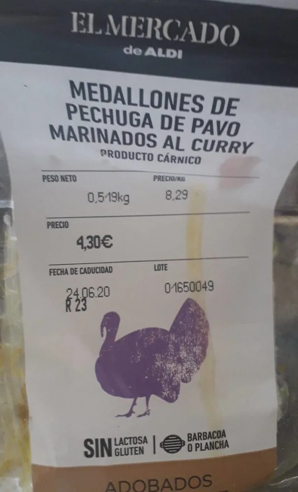 Medallones de pechuga de pavo marinados al curry