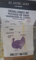 Medallones de pechuga de pavo marinados al curry