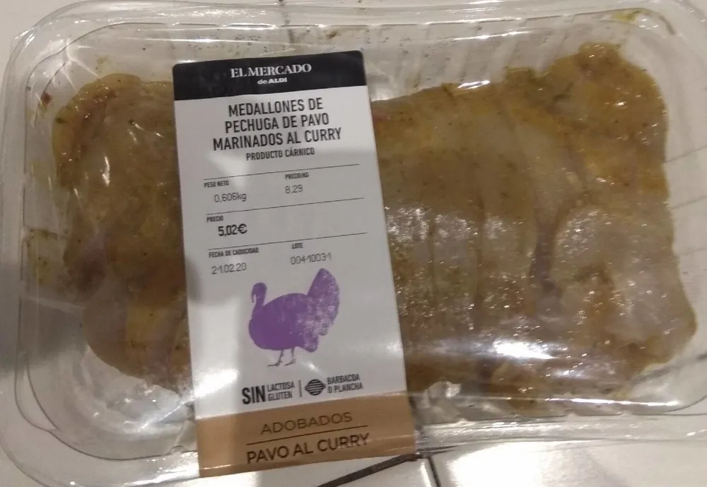 Medallones de pechuga de pavo marinados al curry