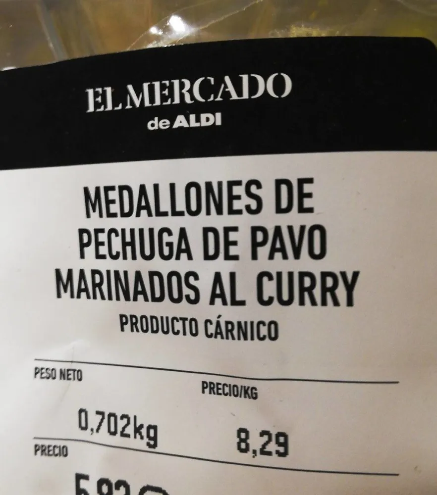 Medallones de pechuga de pavo marinados al curry