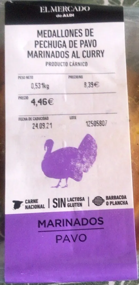 Medallones de pechuga de pavo marinados al curry