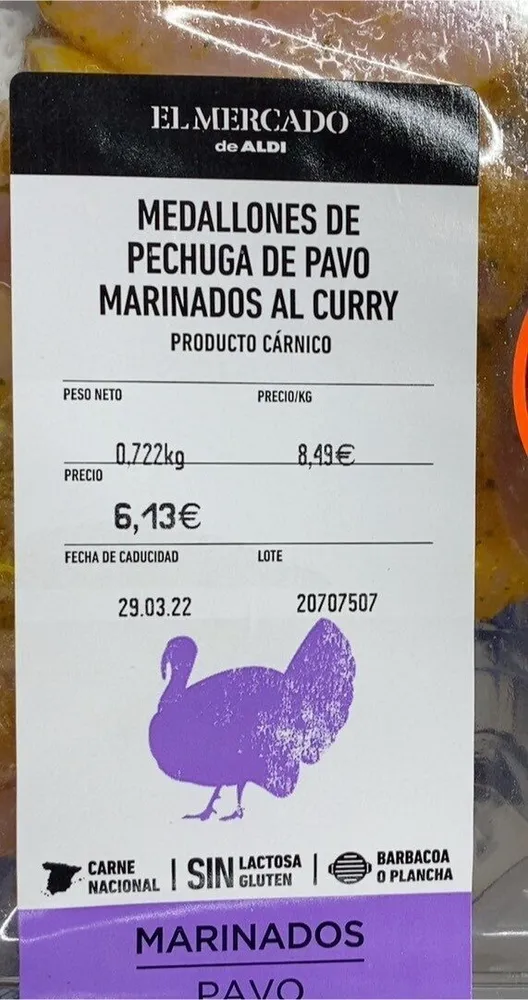 Medallones de pechuga de pavo marinados al curry