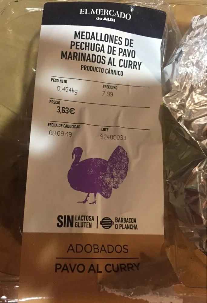 Medallones de pechuga de pavo marinados al curry