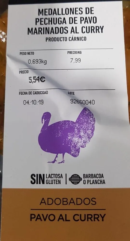 Medallones de pechuga de pavo marinados al curry