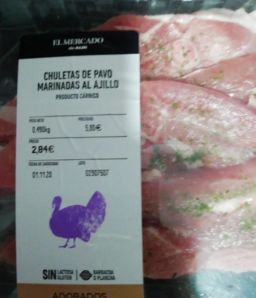 Chuletas de pavo marinadas al ajillo