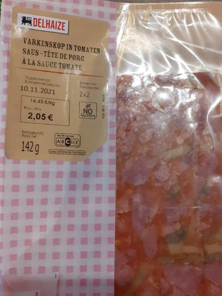 Tête de porc sauce tomate
