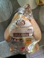Poulet jaune fermier - elevé en pleine air.
