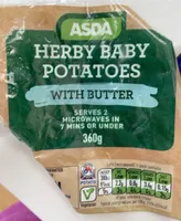 Herby potatoes with salted butter, mint and parsley