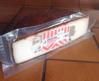 Queso de cabra semicurado untado en pimentón