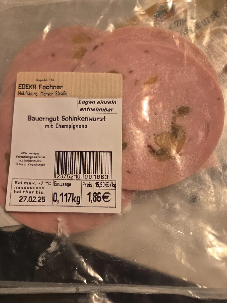 Schinkenwurst mit Champignons