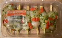 Brochettes de noix de saint jacques crues ail fines herbes