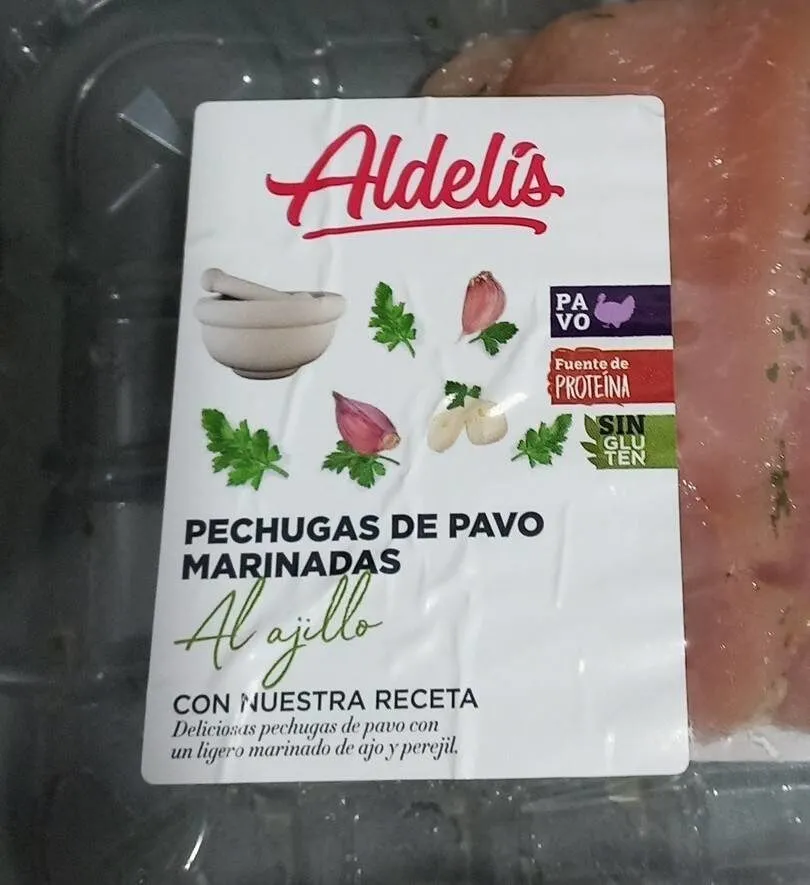 Pechugas de pavo marginadas al ajillo