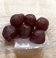 Poire entière rouge confite