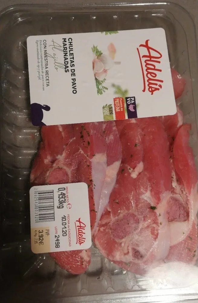 Chuletas de pavo marinadas al ajillo.
