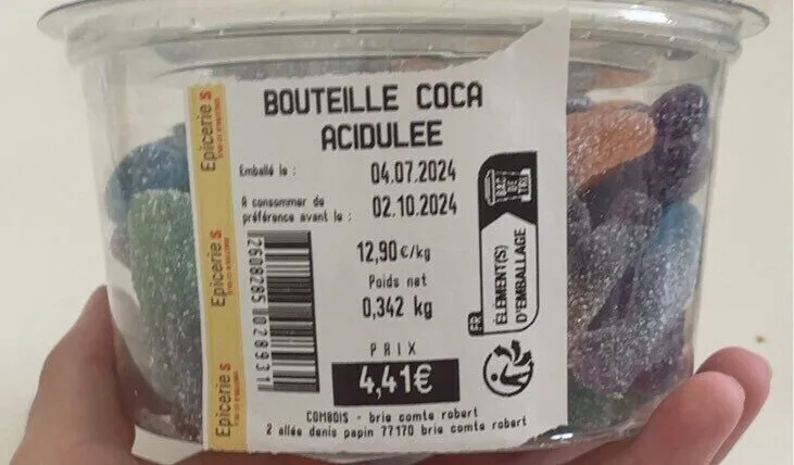 Bouteille de coca acidulee