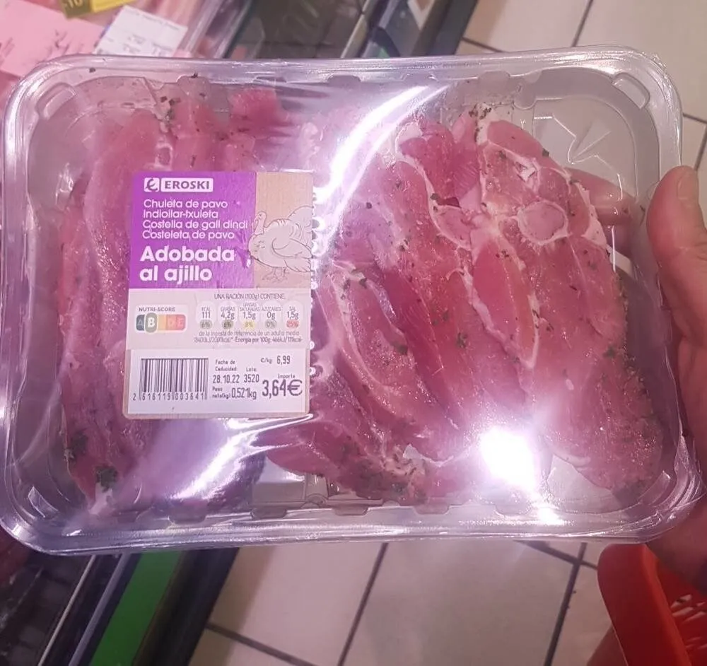 Chuleta de pavo adobado al ajillo