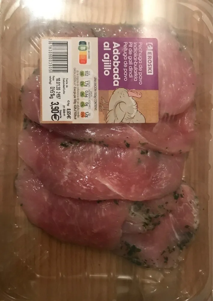 Pechuga de pavo adobada al ajillo