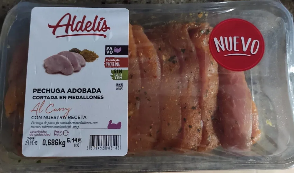 PECHUGA ADOBADA CORTADA EN MEDALLONES AL CURRY