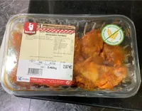 Alas partidas de pollo adobadas paprika